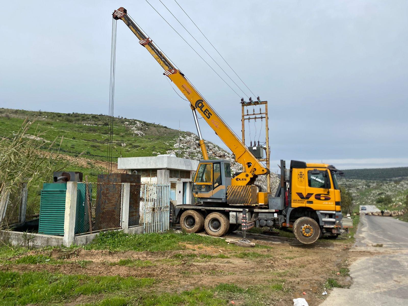 Heavy-duty crane positioned at pump station